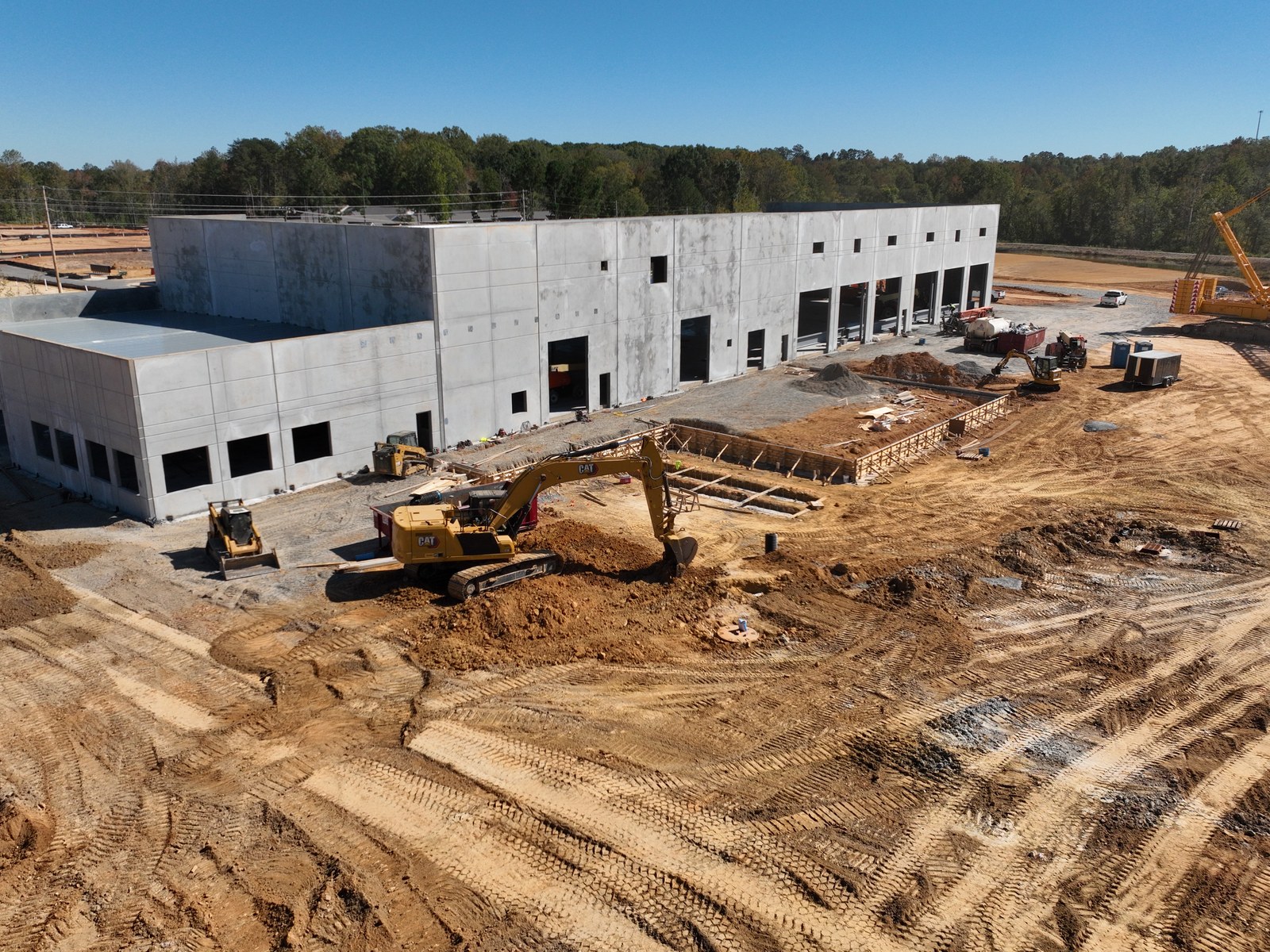 Carolina CAT Gastonia building shell with active sitework and equipment nearby